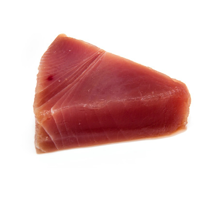 Yellowfin tuna steak isolated ona  white studio background.の写真素材