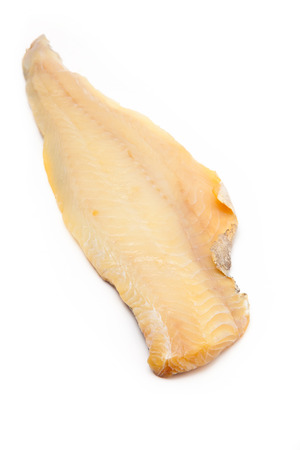 Smoked Haddock isolated on a white studio background.の写真素材
