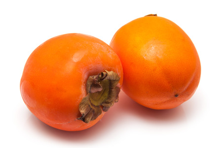 Persimon or sharon fruit isolated on a white studio background.の写真素材