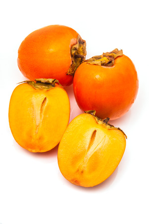 Persimon or sharon fruit isolated on a white studio background.の写真素材