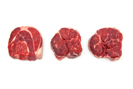 Uncooked organic shin of beef meat isolated on a white studio background,の写真素材