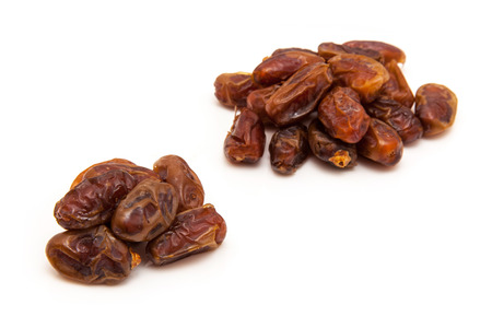 Halawi dates isolated on a white background. の写真素材