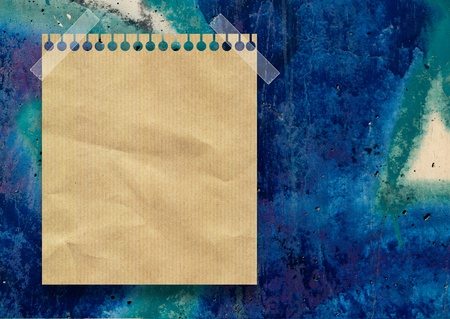 EMPTY CRUSHED SHEET FROM  NOTEBOOK ON GRUNGE BACKGROUNDの写真素材