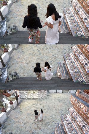 Two thai friends visiting the temple of Wat Arun in Thailandの写真素材