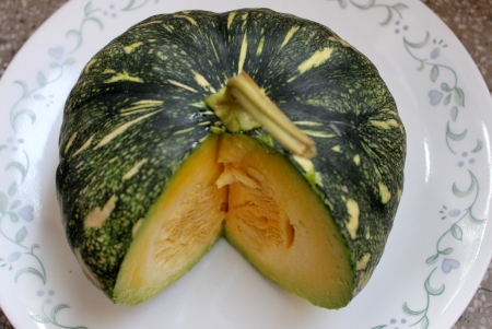Cucurbita moschata, commonly sold in Indian markets under the name kadu, petha or sita phal  young fruit green with yellowish-white patches  Flesh initially light yellow turning orange yellow when ripe  Commonly cooked as vegetable  の写真素材