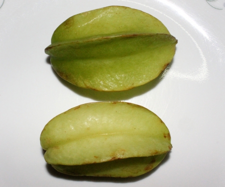 Averrhoa carambola, tree produces fruit with usually distinctive ridges, fruit resembling star in cross-section, edible fruit, cooked into relishes, preserves, and juice drinks, also used raw in chattsの写真素材