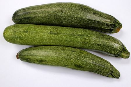 Australian Green Summer squash, cultivar with dark green fruit with light coloured dots, small patches and fiant stripes, narrowed at attachment end, tender with delicious flesh, 20-30 cm long, vegetableの写真素材