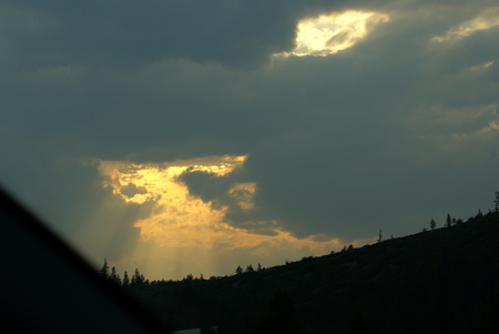 Shasta mountain range, California, USA with dense orange yellow and nearly black clouds above mountains.の写真素材