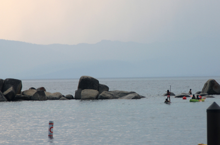 Sand harbor, Tahoe Lake on Nevada side, a popular destination for water activities, with huge rocks deep inside lake popular jumping platform for swimmers.のeditorial素材