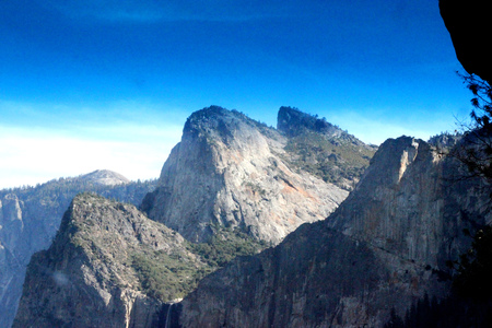 Cathedral Rocks, Yosemite National Park, zoomed in view from Tunnel View, three prominent peaks, Upper and Miidle visible, Lower partially visible, climb a real challenge for hikers.の写真素材