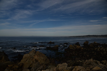 Point Joe, Pebble Beach, 17 Mile Drive, California, USA, scenic point with large rocks, providing pleasant view of surfing sea, whales and migratory birds.の写真素材