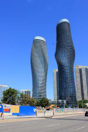 Absolute World, twin towers skyscraper Residential Complex, MissiSSauga, Ontario, Canada, construction completed in 2012, larger tower twisted 209 degrees from base to top, nicknamed Marilyn Monroe Towers.のeditorial素材