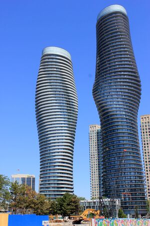 Absolute World, twin towers skyscraper Residential Complex, MissiSSauga, Ontario, Canada, construction completed in 2012, larger tower twisted 209 degrees from base to top, nicknamed Marilyn Monroe Towers.のeditorial素材