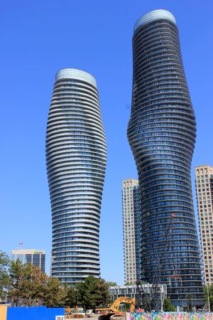 Absolute World, twin towers skyscraper Residential Complex, MissiSSauga, Ontario, Canada, construction completed in 2012, larger tower twisted 209 degrees from base to top, nicknamed Marilyn Monroe Towers.のeditorial素材