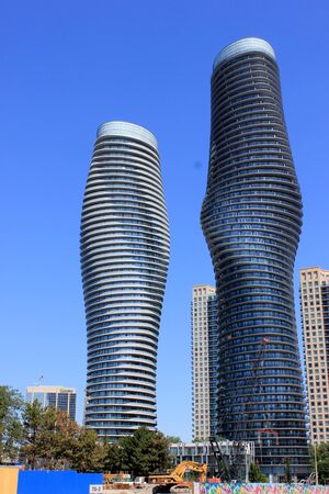 Absolute World, twin towers skyscraper Residential Complex, MissiSSauga, Ontario, Canada, construction completed in 2012, larger tower twisted 209 degrees from base to top, nicknamed Marilyn Monroe Towers.のeditorial素材