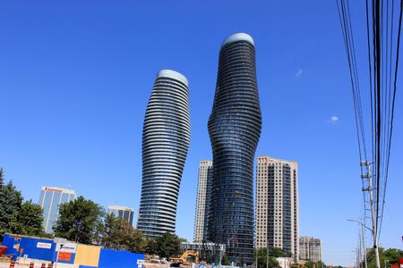Absolute World, twin towers skyscraper Residential Complex, MissiSSauga, Ontario, Canada, construction completed in 2012, larger tower twisted 209 degrees from base to top, nicknamed Marilyn Monroe Towers.のeditorial素材
