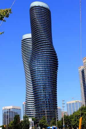 Absolute World, twin towers skyscraper Residential Complex, MissiSSauga, Ontario, Canada, construction completed in 2012, larger tower twisted 209 degrees from base to top, nicknamed Marilyn Monroe Towers.のeditorial素材