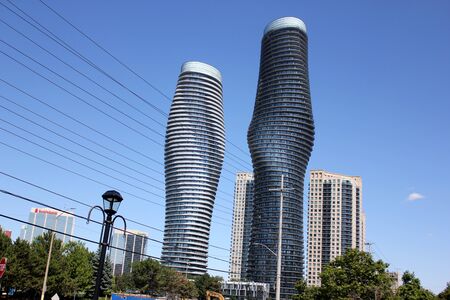 Absolute World, twin towers skyscraper Residential Complex, MissiSSauga, Ontario, Canada, construction completed in 2012, larger tower twisted 209 degrees from base to top, nicknamed Marilyn Monroe Towers.のeditorial素材