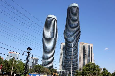 Absolute World, twin towers skyscraper Residential Complex, MissiSSauga, Ontario, Canada, construction completed in 2012, larger tower twisted 209 degrees from base to top, nicknamed Marilyn Monroe Towers.のeditorial素材