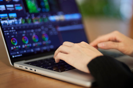Japan woman creator editing videos on a laptopの写真素材