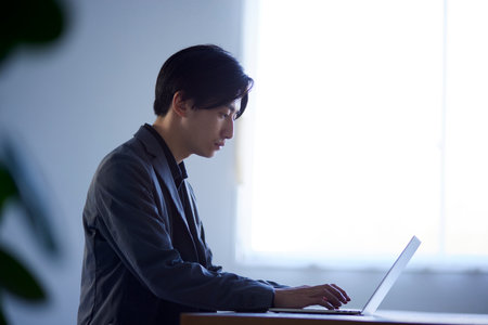 Japan businessman working in officeの写真素材
