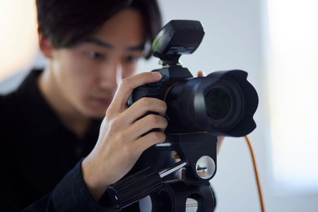 A Japan photographer taking pictures at a photo studio