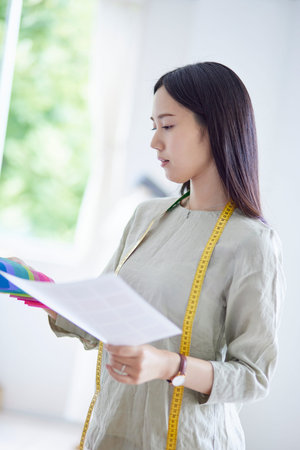 Working Japan fashion designer in his 20s