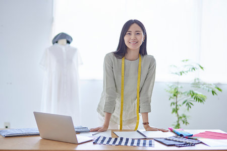 Working Japan fashion designer in his 20sの写真素材