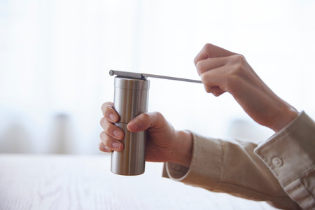 Woman's hand making drip coffeeの写真素材