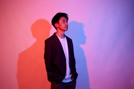 Colorful portrait of young businessmanの写真素材