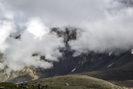 Mountain peaks in the clouds.