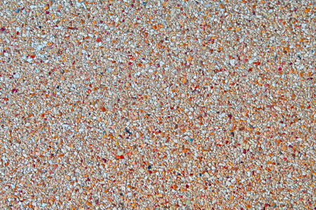 Surface with gravel seamless texture and a beautiful stones. Useful as background for wallpaper...