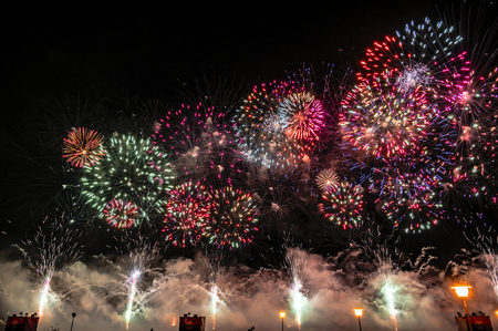 Festive fireworks on black background. Copy space.の写真素材