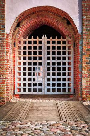 Gate with a lattice of an ancient castle.の写真素材