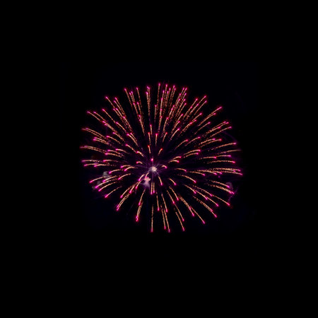 Beautiful abstract pattern with salute fireworks on dark background.の写真素材