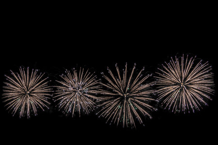 Beautiful abstract pattern with salute fireworks on dark background.の写真素材