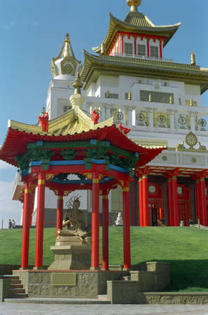 Buddhist pagoda on a background of a Buddhist temple - palace.の写真素材