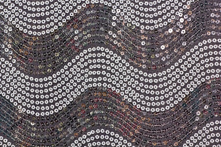Silver buttons pattern on fabric for background 