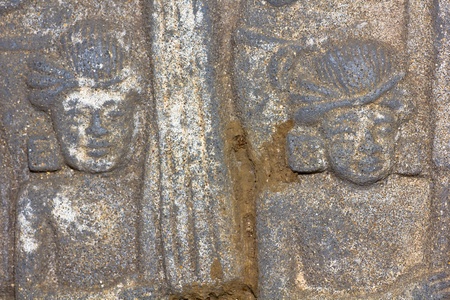Native art carved on the wall in the temple 