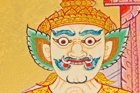 The face of giants  Vintage traditional Thai style art painting on temple for backgroundのeditorial素材