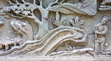 Native art carved on the wall in the temple, Generality in Thailand, any kind of art decorated in Buddhist church etc  created with money donated by people, no restrict in copy or useの写真素材