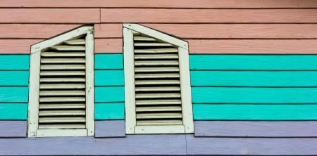 Windows and a colorful wood backgroundの写真素材