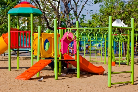 Colorful playground equipment at an outdoor parkの写真素材