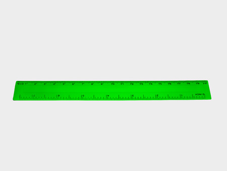 Green ruler isolated on white background.の写真素材