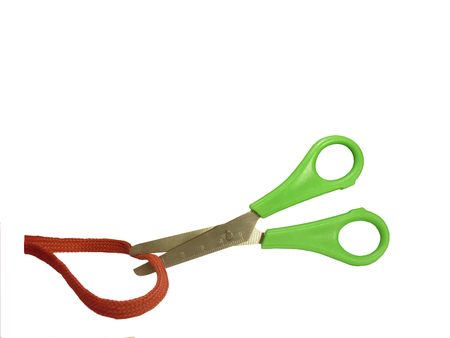 scissors cut a red ribbonの写真素材