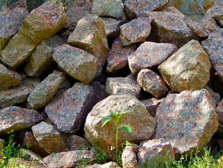 Granite crushed stone. pile of granite stone pileの写真素材