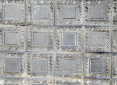 Texture of old paving slab close-up. Red old tiles.