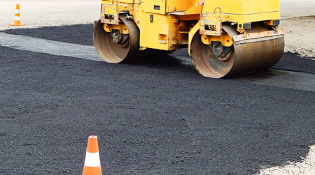 paver Road construction, asphalt concrete pavementの写真素材