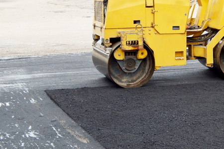 paver Road construction, asphalt concrete pavementの写真素材