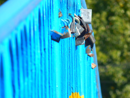 love lock symbol attached on the bridge of eternal friendship and love, the concept of the union of spouses.の写真素材